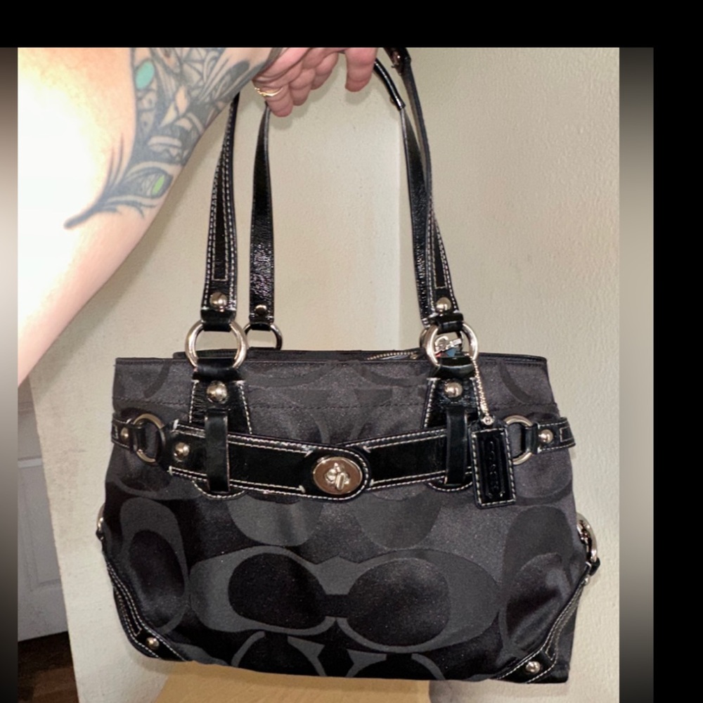 Beautiful black coach shoulder bag with blue interior
